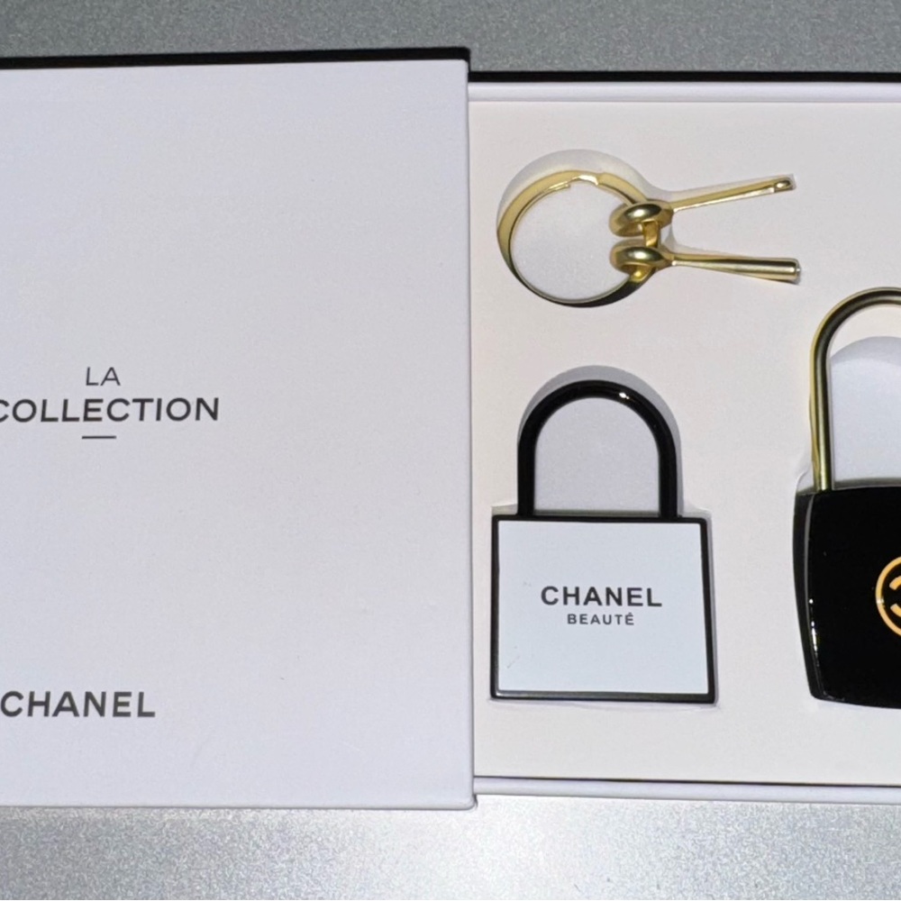 CHANEL Black and Gold Padlock Duo